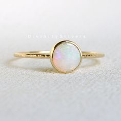 Gemstone- Opal Material-925 Sterling Silver ring size - All Size available Stone Size - Size depend on the ring size Add this beautiful one little thing of galactic shine in your accessories to make you feel unique and to transform your lives.Perfect for any kind of outfit and every occasion. We accept custom and personalized order. It can be change in the gemstone, ring design and ring size. Please send us message if you are interested in a custom creation ❏ Important information ► My customer Opal Ring Simple, Raw Opal Ring, Australian Opal Ring, Opal Diamond Ring, Natural Opal Ring, October Birthstone Rings, White Opal Ring, Fire Opal Ring, Opal Ring Gold