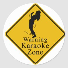 a warning sticker with the words warning karaoke zone on it's side