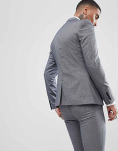 Suit jacket by Rudie Take that dress code up a level Patterned lining Lined with internal pocket It's what's on the inside that counts Peak lapels Built-in pocket square Single button opening Functional pockets Center-back vent Skinny fit A tight cut for a sleek shape Semi-formal Slim Fit Gray Blazer, Gray Slim Fit Blazer For Semi-formal Occasions, Formal Gray Suit With Pockets, Gray Winter Suit With Welt Pockets, Fitted Blazer With Pocket Square And Suit Collar, Gray Notch Lapel Blazer With Pockets, Fitted Blazer With Pockets For Business Meetings, Gray Long Sleeve Suits With Welt Pockets, Workwear Blazer With Pocket Square And Suit Collar