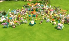 a group of pokemon figurines are in the grass