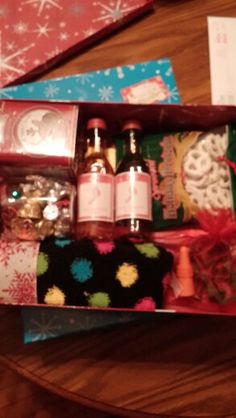 an open gift box filled with lots of different items