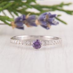 Amethyst Engagement Ring, Womens Engagement Ring, Dainty Engagement Ring, Amethyst Jewelry, Purple Stone Ring, Silver Promise Ring WE OFFER UNLIMITED PERIOD INSTALLMENTS PLAN This is a beautiful, stunning, feminine ring that works well for all occasions, styles, and ages. You will love it! Ring information: Main stone: Amethyst Approximate size: 3.5mm Accent stones: White cubic zirconia Metal type: Silver Metal stamp: 925 Sterling Silver Installment Payments We offer installment payments for an Purple Sapphire Promise Ring With Center Stone, Purple Half Eternity Ring For Anniversary, Amethyst Birthstone Ring With Center Stone For Promise, Purple Crystal Promise Ring, Purple Dainty Birthstone Promise Ring, Purple Sapphire Promise Ring In Fine Jewelry, Amethyst Diamond Promise Ring With Accent Stones, Purple Sapphire Ring For Promise, Purple Diamond Ring With Prong Setting For Promise