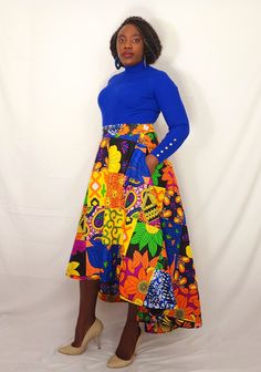 ✨️This African Print High-low skirt features a high banded waist, two-sided pockets and a zipper closure at the back. ✨️This skirt is very flattering. It's designed to be full flared, A-line flow with shortened length (at the front that) that gradually increases to full floor length at the sides and back DETAILS: Waist circumference - 33 Shortest Front Length - 31 Full Length (backside) - 44 ✨️Fabric color is vibrant with both abstract and leave patterns. Fabric is designed to imitate patch patterns.  ✨️Guaranteed no-fade and no-color run if care instructions are followed through.  ✨️Made from 100% cotton fabric. Whether your style is high-end, casual, simple, formal or informal, this flared African print skirt would satisfy your needs. Item is handmade by local artisans and tailored to it Fitted Multicolor Skirt For Fall, Blue Fitted A-line Maxi Skirt, Fitted Multicolor Maxi Skirt For Fall, Fitted Multicolor Asymmetrical Skirt, Multicolor Flared Maxi Skirt For Fall, Fitted Flared Wrap Skirt For Fall, Multicolor Fitted Long Wrap Skirt, Multicolor Asymmetrical Lined Skirt, Blue A-line Skirt For Fall