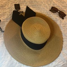 Brand New Adjustable, Soft, Beach Hat With Black Band. Lightweight Chic Straw Hat For Vacation, Chic Lightweight Straw Hat For Vacation, Chic Sun Hat With Upf 50+ For Vacation, Chic Straw Sun Hat For Vacation, Trendy Fedora Sun Hat For Pool, Chic Lightweight Panama Hat For Vacation, Trendy Wide Brim Straw Hat For Poolside, Vacation Brimmed Boater Hat, Brimmed Boater Hat For Vacation