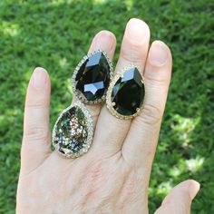 "Black Cocktail Ring For Women, Black Teardrop Ring, Wedding Ring Big Black cocktail ring! Black oversize premium crystal ring! Oversized pear shaped ring!  You may choose the Center stone color, The metal finish you like and the little halo crystals color. A sparkly comfortable adjustable ring made with a large (20mm/30mm) Tear Drop shaped premium high quality crystals. surrounded by sparkling small crystals. A statement ring, hard to ignore. some details :  One large 20mm/30mm Teardrop stone, Black Ring Wedding, Black Cocktail Ring, Pear Shaped Ring, Teardrop Ring, Black Ring, Black Cocktail, Crystal Ring, Ring Women, Ring Wedding