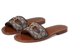 COACH Ina Jacquard Sandal - Women's Shoes : Maple/Oak : Please Note: COACH items cannot be shipped to military addresses (APO or FPO) and addresses in Hawaii, the Virgin Islands, Guam or any other locations outside of the continental US. The COACH Ina Jacquard Sandals feature a wide strap with hardware detailing and easy to wear design. Textile upper. Leather and synthetic lining and insole. Easy slip-on style. Open round toe. Textile and synthetic outsole. Imported. Measurements: Heel Height: 3 Luxury Gucci Slip-on Sandals, Luxury Sandals Trendy, Luxury Slip-on Casual Slides, Luxury Chic Slip-on Sandals, White Gucci Espadrilles For Women, Gucci Casual Luxury Espadrilles, Luxury Chic Gucci Mules, Luxury Summer Slippers, Coach Georgie Sandal