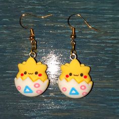 Super Cute Earrings Featuring Togepi In A Chibi Style. Handmade. Resin. Measures 1" X 1". Pricing Is Firm On Boutique Items. Thank You For Your Understanding. Handmade Multicolor Kawaii Earrings, Fun Yellow Earrings With Ear Wire, Adjustable Kawaii Dangle Earrings, Yellow Novelty Earrings With Ear Wire, Novelty Yellow Earrings With Ear Wire, Playful Yellow Dangle Earrings, Cute Adjustable Pierced Jewelry, Playful Yellow Drop Earrings Jewelry, Playful Yellow Drop Earrings