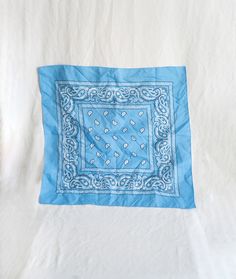 Vintage light blue square bandana. Lovely scarf with white and black botanical motifs. MATERIAL - 100% polyester CONDITION - Excellent vintage condition MEASUREMENTS - 19.5x19.5" (50x50cm) Please note that this is a vintage item and may show general signs of wear If you have any questions, please, do not hesitate & contact me! Casual Blue Bandana For Summer, Casual Blue Bandana, Blue Casual Bandana Print Scarf, Casual Blue Scarves With Bandana Print, Casual Blue Bandana Print Scarf, Blue Square Summer Scarves, Light Blue Bandana, Outfit Bandana, Botanical Motifs