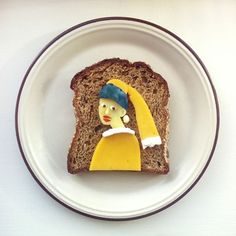 a piece of bread that has been made to look like a woman