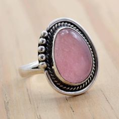 Pink Sterling Silver Ring With Stone Setting, Chic Oval Natural Stone Promise Ring, Oval Natural Stone Promise Ring, Oval Natural Stones Promise Ring, Pink Oval Moonstone Ring, Pink Rings With Natural Stones For Anniversary, Pink Oval Opal Ring In Sterling Silver, Pink Oval Moonstone Ring In Sterling Silver, Sterling Silver Ring With Large Pink Stone