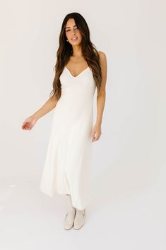 a timeless knit midi dress for every season, it features a flirty sweetheart neckline + a jaw-dropping fitted silhouette. whether you dress it up with heels for rooftop cocktail parties, or down with sneakers for semi-casual date nights, this creme white midi dress is a wardrobe staple. creme // midi length, sweetheart neckline, seam detailing model is 5'8" + wearing a small measurements are approximate + taken while laying flat small : bust 26” length 48” medium : bust 28” length 48” large : bu Sweetheart Neckline Midi Dress For Date Night, Midi Slip Dress With Fitted Bodice For Night Out, Elegant Maxi Dress With Spaghetti Straps For Day Out, Spring Slip Dress With Sweetheart Neckline For Brunch, Spring Brunch Slip Dress With Sweetheart Neckline, Fitted Bodice Midi Slip Dress For Night Out, Fitted Bodice Midi Length Slip Dress For Night Out, Cream Midi Length Dresses For Day Out, Casual Brunch Midi Maxi Dress With Fitted Bodice