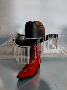 Rhinestone cowgirl hat in black with long fringe Can be made in any color, message me about different color options! All rhinestone hats are made to order. Can be customized with different paint colors as well. Please allow 1-2 weeks for production. Estimated time to receive product is 2-3 weeks (sometimes I can get them made quicker, please message me if you need yours by a specific date). Every hat is handcrafted from start to finish. Slight variation in the appearance of each uniquely made it Fringe Cowboy Hat, Rhinestone Cowgirl Hat, Rhinestone Hats, Cowboy Hat Black, Rhinestone Cowgirl, Rhinestone Fringe, Cowgirl Hat, Fantasy Closet, Long Fringe