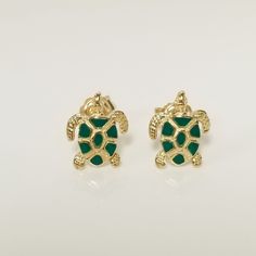 "Thanks for shopping our vintage estate store. We tend to sell well below wholesale and truly hope you enjoy all of our items. Many of the items are one of a kind, so please enjoy scrolling through the pictures and hopefully something will catch your eye. Brown spots are from camera. Beautiful estate 10k yellow gold sea turtle green enameled studs. Size: 8mm by 11mm 3/8\" Weight: .50 gram Carat: .025 per stud Marked 10k and they are sweet studs. As with most estate items there may be some wear on item. We do not sell new items, nor do we charge new retail prices." Green Enamel Clip-on Earrings As Gift, Green Enamel Clip-on Jewelry, Gold Enamel Clip-on Earrings, Classic Green Enamel Jewelry, Classic Gold Enamel Earrings, Gold Enamel Clip-on Earrings For Gift, Nickel-free Yellow Gold Enamel Earrings, Yellow Gold Clip-on Enamel Earrings, Yellow Gold Enamel Clip-on Earrings