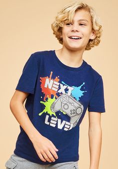 Elevate his gaming style with this fun and vibrant jersey knit tee, featuring a 'next level' gamer graphic for the ultimate player-ready look! Graphic Print Short Sleeve Tops For Gaming Events, Casual Tops With Letter Print For Gaming Events, Casual Top With Letter Print For Gaming Events, Casual Letter Print Top For Gaming Events, Gamer Style Character Print Tops For Streetwear, Casual Short Sleeve T-shirt For Gaming Events, Gamer Style Short Sleeve Top With Letter Print, Crew Neck Letter Print T-shirt For Gaming Events, Pre-shrunk Graphic Tee For Gaming Events