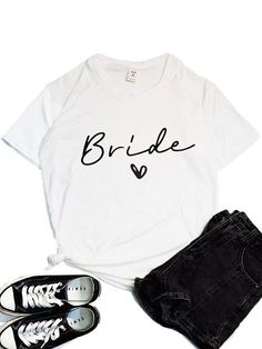 a t - shirt with the word bride written on it and two pairs of shoes