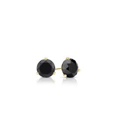 Black diamond stud earrings are a bold trending fashion statement. These round cut circle black diamond studs pair sparkle with a total weight of 0.25 ctw. that add a subtle statement to your wardrobe. Making these a style necessity. Set in stylish 3-prong martini settings and are available with push-back or screw backings. These 14kt yellow gold earrings are the perfect combination of tones to set of the jet black diamonds. Black Diamond Stud Earrings, Round Diamond Stud Earrings, Black Diamond Pendant, Martini Set, Black Diamond Earrings Studs, Black Diamond Studs, Halo Diamond Earrings, Solitaire Diamond Pendant, Earrings Sparkle