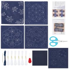 sewing supplies including scissors, thread, and stitching needles are laid out on a white surface