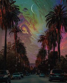 cars driving down a street with palm trees in the foreground and an image of swirling swirls on the sky