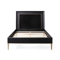 a black bed frame with gold trimmings and wooden slatted headboard