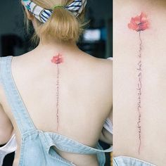 the back of a woman's neck with two flowers on her left and one flower on