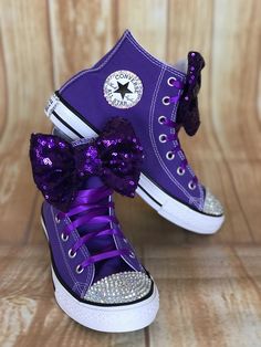 Purple Converse Touch of Bling Sneakers Little Kids Shoe Size 10-2 These authentic Purple Converse have a touch of bling on the toe, Converse emblem and back of the shoe. They are accessorized with a pink sequin bow. Information about the shoes All sneakers are Converse brand and have a mix of hand applied high quality glass crystals and resin flat-backs. Please select your color choice by the available drop down options, an option of all glass crystals no color is also available. Converse sizin Purple Round Toe Party Sneakers, Bedazzle Shoes, 2024 Purple, Ladybug Tutu, Bling Sneakers, Converse Collection, Tenis Converse, Birthday Party Dresses, Diy Bling