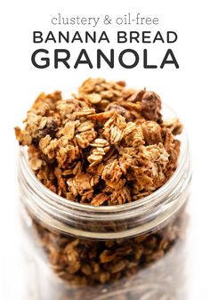 a glass jar filled with granola on top of a white surface and the words clusterer & oil - free banana bread granola