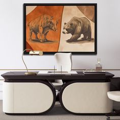 an office with two rhinos on the wall and a chair in front of it