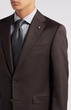 Italian wool styled in a deep, rich burgundy smartens a suit crafted for year-round versatility with traditional notched lapels and tapered flat-front trousers. Top= 28 1/2"; bottom= 36 1/2" inseam; 14 1/2" leg opening; 10" front rise; 16" back rise (size 42) Jacket has notched lapels; chest pocket; flap pockets; side vents Trousers have zip fly with hook-and-bar closure; slant pockets; back button-welt pockets Jacket is lined Unhemmed 100% wool Dry clean Imported Brown Suits With Hidden Button Closure For Office, Brown Single Button Suit For Work, Formal Single Button Brown Blazer, Tailored Brown Suits With Hidden Button Closure, Formal Brown Blazer With Welt Pockets, Timeless Brown Notch Lapel Suit, Brown Suits With Hidden Button Closure, Brown Notch Lapel Formal Blazer, Formal Brown Blazer With Concealed Placket