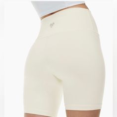 Size Medium New With Tags Tna 7” Shorts In A Creamy White Color Super Buttery Soft White Compression Biker Shorts With Built-in Shorts, White Bottoms With Built-in Shorts, White Sports Shorts With Short Inseam, Compressive Summer Shorts, White Stretch Athletic Shorts With Short Inseam, White Stretch Athletic Shorts, Stretch White Athletic Shorts, White Activewear With Built-in Shorts For Summer, White Athletic Shorts For Workout With Short Inseam