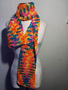 A very colorful and cozy crochet scarf, long and easy to wrap around your neck for layers Made by: Aimee Warm Multicolor One-size Scarves, Warm Casual Multicolor Scarves, Warm Multicolor Casual Scarves, Casual Warm Multicolor Scarves, Multicolor Acrylic Casual Scarves, Fall Multicolor Crochet Scarf, Multicolor Crochet Scarves One Size, Casual Multicolor Crochet Scarves, Casual Multicolor Hand Knitted Scarves