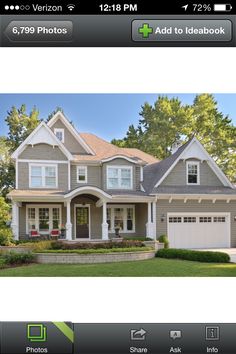 a house with two garages on the front and one in the back that is for sale