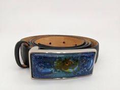 This belt is a work of art, truly one of a kind. Made by renowned artist and designer Qualheim Bollorini, this belt is gorgeous! The buckle is made of hand-blown bubble glass. The belt is made of fine Italian leather and is an extra-large. This belt will make any outfit pop, whether it is formal or just jeans and a t-shirt. *Please pay close attention to my photos and descriptions. I do not accept returns or refunds. I am happy to answer any questions about the items Artisan Adjustable Belts As Gifts, Adjustable Artisan Belt As Gift, Elegant Handmade Belt Buckles As Gifts, Adjustable Artisan Belts For Gifts, Handmade Artisan Belts For Gifts, Handmade Artisan Belt As Gift, Elegant Handmade Adjustable Belt, Resin Belt Buckle, Luxury Vintage Collectible Belt Buckles