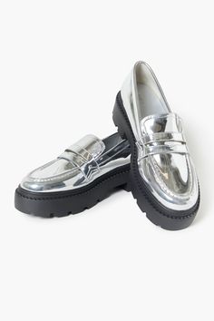 Trendy Synthetic Platform Loafers With Textured Sole, Trendy Synthetic Loafers With Lug Sole, Trendy Synthetic Loafers With Rubber Sole, Spring Patent Leather Platform Loafers With Lug Sole, Modern Silver Loafers With Round Toe, Synthetic Platform Loafers With Lug Sole, Silver Round Toe Loafers For Work, Silver Round Toe Loafers For Spring, Synthetic Flat Loafers With Lug Sole