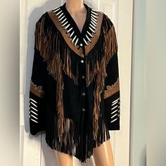 This Jacket Is In Beautiful, Preowned Condition Without Any Flaws. Snap Front. Beautiful Bone And Stud Decorations Around The Neckline, Across The Back And The Sleeves. Fully Lined, Brown And Black Fringe Is Very Long. The Tag Says This Is A 3x But It Does Run Smaller So Please Notice The Measurements And If You Need Any Other Measurements, Please Message Me. Measurements: Shoulders: 19” Bust: 46” Sleeves: 24.5” Hips: 44” Studded Jacket, Black Fringe, Suede Fringe, Leather Women, Black And Brown, Jackets & Coats, Jackets For Women, Leather Jacket, Leather