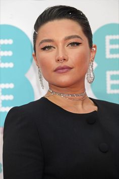 an image of a woman wearing jewelry on the red carpet