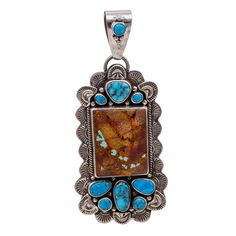 1 1/2" by 1 3/4" Bail Size: 5/8" This stunning pendant, made by Diane Wylie who is a self taught Navajo Silversmith, has been creating diverse designs since her youth. This pendant features a center, square, stone of Boulder Turquoise, and then is surrounded on either end by Dry Creek and Kingman Turquoise stones. With silver roping lining the sides of the Boulder Turquoise, and small, delicate, silver buttons framing the smaller Dry Creek and Kingman Turquoise stones, the sterling silver decora Button Frames, Self Taught, Dry Creek, Square Stone, Turquoise Stones, Kingman Turquoise, Silver Buttons, Turquoise Pendant, Turquoise Stone