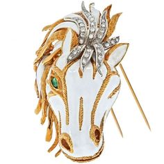 Capture the essence of elegance and boldness with the David Webb Platinum & 18K Yellow Gold White Enamel Diamond Horse Face Brooch. This stunning piece is a true masterpiece, exuding an air of sophistication and artistry. The intricate horse head design, adorned with captivating white enamel, is a testament to the brand's impeccable craftsmanship.The brooch features a mesmerizing emerald eye that adds a touch of allure to the piece. Surrounding the eye are 34 exquisite round diamonds, glistening Luxury White Hallmarked Brooch, Exquisite White Brooch For Formal Occasions, Luxury Hallmarked White Brooches, Luxury White Gold Brooches Collectible, Luxury White Gold Collectible Brooch, Luxury White Gold Collectible Brooches, Luxury White Brooch For Gift, Luxury White Brooches For Gifts, Luxury White Brooches As Gift