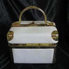 Extremely Rare Vintage 1980's Era Hard Sided Train Case Style Box Purse Handbag. This Gorgeous Piece Designed By Lisette New York Is In Very Good Condition. You See Some Aging On The Interior But The Lining Is Intact. No Rips Or Tears Inside Or Out. All Hardware Is In Excellent Condition. Bag Is Textured White With A Golden Sheen All Over. Please Zoom Pictures They Are The Best Description Message Me With Any Questions. Best Offers Always Welcome Ships Within 24 Hrs Have An Awesome Day Have An Awesome Day, Box Purse, Style Box, Brown Suede Jacket, Train Case, Rain And Snow Boots, Boot Sandals, Snow Boots, Laptop Bag