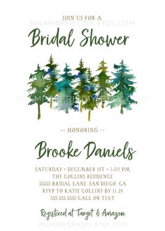 the bridal shower party is set up with pine trees and blue watercolor paint