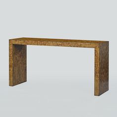 a wooden table with an interesting design on it's top and bottom part, made out of wood