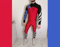 Amazing one-piece outfit Adidas  Fat Material Lycra, color- Black, blue, Dark red, yellow Good condition 8/10   One-piece outfit for walking/ for dancing/ gymnastics/ running/ trekking/ gym/ ski riding Size XL, Good on L/XL Crazy One-Piece OUTFIT: A- total length ~~137cm B- width under the armpits ~~48cm C- width of the talie ~~40cm I Invite you to my other offers :)  Have additional questions? Contact me, I am happy to help! Costume was measured laying flat and relaxed. All sales are final Don' Red Stretch Sporty Bodysuit, Red Fitted Sports Bodysuit, Red Fitted Sporty Bodysuit, Red Fitted Bodysuit For Sports, Fitted Red Bodysuit For Sports, Red Fitted Activewear For Sports Events, Sporty Fitted Bodysuit For Winter, Multicolor Stretch Sports Bodysuit, Outfit Adidas