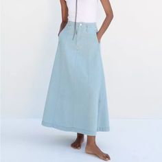 Midi Denim Skirt.Size Small It Has A Stain On The Back High-rise Denim Blue Skirt For Spring, High Rise Denim Blue Denim Skirt For Spring, Blue Straight Leg Skirt For Spring, High Rise Denim Blue Skirt For Spring, Light Blue Long Skirt For Spring, Spring Straight-leg Denim Blue Skirt, Spring Washed Blue Skirt With Pockets, High Waist Washed Blue Denim Skirt, Chic Light Wash Denim Skirt With Pockets