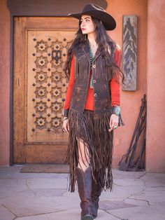 I love a great vest! This is a great finish to any western outfit. Our Whiskey Jessie Fringe vest was created with careful placement of fringe and pockets. Loaded with hand stitching, our Italian leather has and amazing attention to detail. Fun to wear, and a true Wild West Statement! Fine distressed Italian leather in camel's, taupe's and chocolate. We do stock inventory, but please allow 4 weeks, if we are in production, contact if you are in a rush. We can change arm length, but do not divert Western Style Sleeveless Vest For Rodeo, Western Rodeo Vest, Sleeveless Western Outerwear For Fall, Brown Western Vest For Western-themed Events, Western Style Brown Vest For Western-themed Events, Western Style Denim Vest For Fall, Fall Festival Vest With Fringe, Fitted Vest For Western-themed Events In Fall, Brown Fringe Vest For Festival