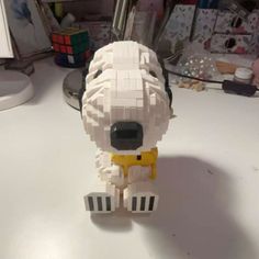 a lego dog sitting on top of a table