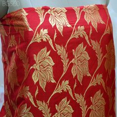 Red Brocade by the yard Fabric Home Furnishing Wedding Dress Gown Bridal Gown Making Banarasi Brocade crafting costume fabric Cushion Cover. This is a beautiful benarse blended silk brocade fabric in Red and Gold.  ➤Product: Brocade Fabric ➤Fabric Type: Blended Silk (Viscose and Silk) Fine quality Zari Brocade Weaving from Banaras ➤Color: Red and Gold ➤Width: 44 inches. ➤Condition: New ➤ Code: bg560 ➤Listing for 1 Yard of fabric. ➤Care: Dry Clean Only You can use this fabric to make Dresses, Tops, Blouses, Jackets, Crafting, Clutches or Evening Bags, Embellish your clothes, Pillows, Drapery, Home Décor, Outdoor, Quilting, Sewing, General, Upholstery etc use it for scrap booking projects. If you purchase more than 1 Yard you will get it in running length, not in pieces. Please note: Any cus Bollywood Style Fabric For Wedding With Unstitched Blouse, Red Brocade Lehenga With Motifs, Red Unstitched Brocade Lehenga, Bollywood Style Wedding Fabric With Unstitched Blouse, Red Brocade Dupatta With Traditional Drape, Traditional Red Brocade Embroidered Fabric, Red Fabric With Zari Work For Festivals, Red Wedding Fabric With Zari Work, Festive Red Dupatta Fabric