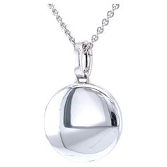 Victor Mayer round customizable polished locket pendant necklace, 18k white gold, Hallmark Collection, diameter app. 21.0 mm About the creator Victor Mayer Victor Mayer is internationally renowned for elegant timeless designs and unrivalled expertise in historic craftsmanship. Lovers of the extraordinary appreciate the beauty of Victor Mayer's designs, which use extremely rare techniques such as genuine enamel or elaborate engravings. Since 1890, the company has stood for the finest jewellery Ha White Gold Round Jewelry With Polished Finish, White Gold Jewelry With Polished Finish, Polished White Gold Jewelry, Luxury Polished Pendant Locket Necklace, Classic White Gold Round Jewelry, White Gold Jewelry With Polished Finish And Round Pendant, Classic Hallmarked White Gold Locket Necklace, Formal White Gold Oval Pendant Locket Necklace, Classic Round Disc Jewelry With Polished Finish