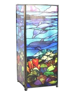 a stained glass cabinet sitting on top of a table