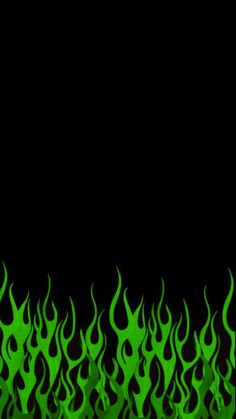 green fire flames against a black background