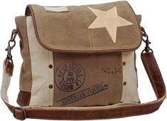 PRICES MAY VARY. {Lightweight Canvas Purse} Rugged, sturdy two tone stamped high quality canvas, leather trim, recycled Military canvas, fully lined with printed material and genuine leather accents {Perfect for Day or Weekend Trips} This women’s purse has decorative brass hardware, star leather, top zipper closure, and measures 10.5" wide by 3.5" deep by 9" high {Hand-Crafted Quality} We follow a specific process in the creation of our upcycled canvas purses and handbags which includes material Canvas Purse, Canvas Messenger Bag, Vintage Star, Pretty Bags, Women Leather, Cute Bags, Canvas Shoulder Bag, Outfit Casual, Vintage Bags