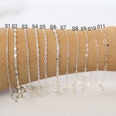 Sterling silver chain in a variety of styles.  Perfect for permanent jewelry.  Premium quality. Shiny and strong.  Cut to size and I will send one continuous length of chain. Sample Pack: you get one inch of chain per style.  S1: Bar Link Chain (works with 22 gauge or thinner jump rings)       width: 0.9mm       loop inside diameter: 0.76mm        bar length: 12.7mm  S2: Flat Disc Chain (works with 22 gauge or thinner jump rings)         width: 2.5mm        link length: 3.56mm S3: Diamond Cut Ov Dainty Silver Delicate Chain Bracelet, Silver Dainty Chain Link Bracelet, Silver Cable Chain Bracelet As A Gift, Silver Dainty Oval Link Chain Bracelet, Silver Bracelets With Delicate Oval Link Chain, Dainty Sterling Silver Chain Link Jewelry, Dainty Hypoallergenic Silver Chain Necklace, Silver Link Bracelet With Delicate Chain, Adjustable Silver Cable Chain Bracelet